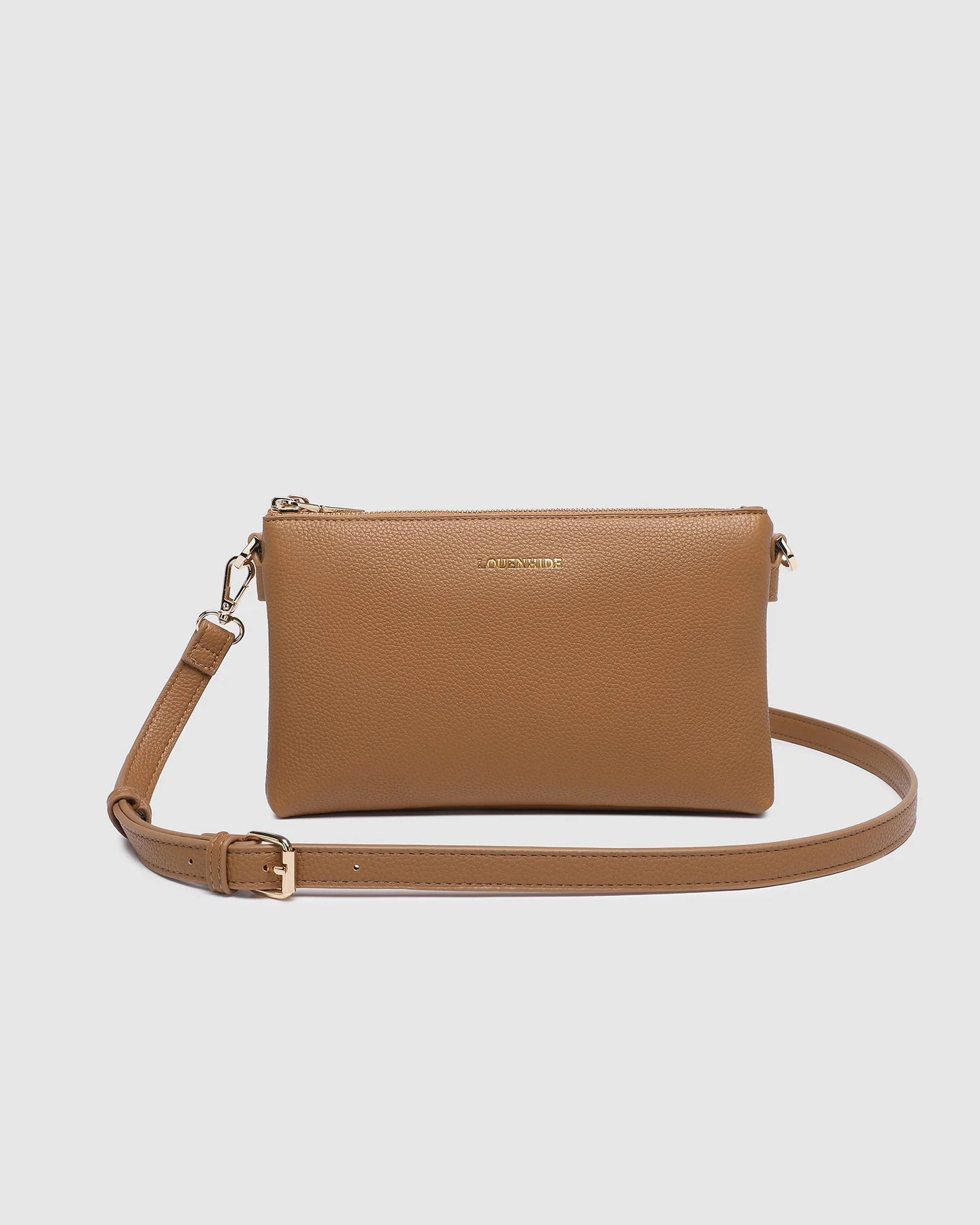 Beige handbag with a strap on a light gray background
