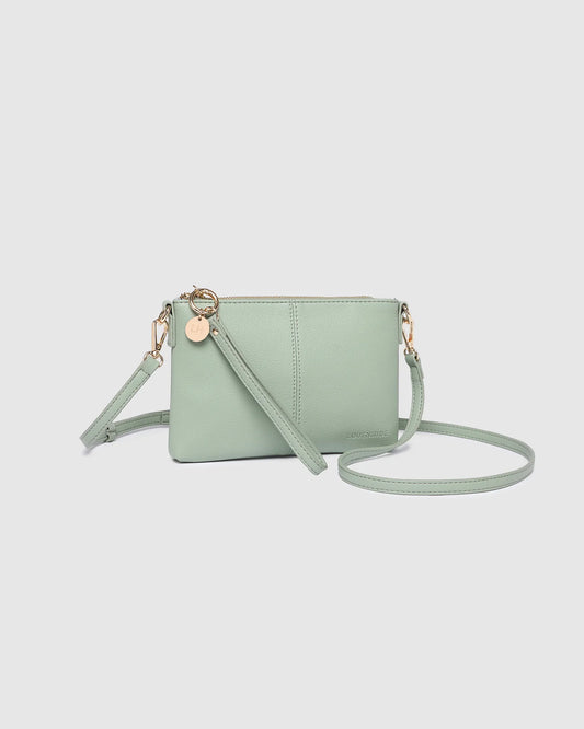 Light green (sage) crossbody bag on a white background