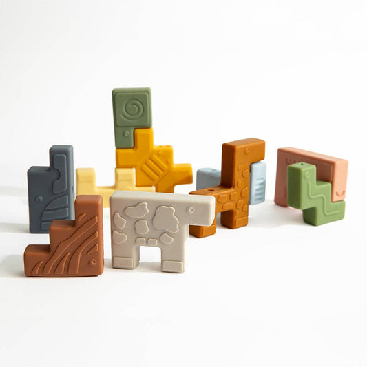 Colorful geometric block toys on a white background