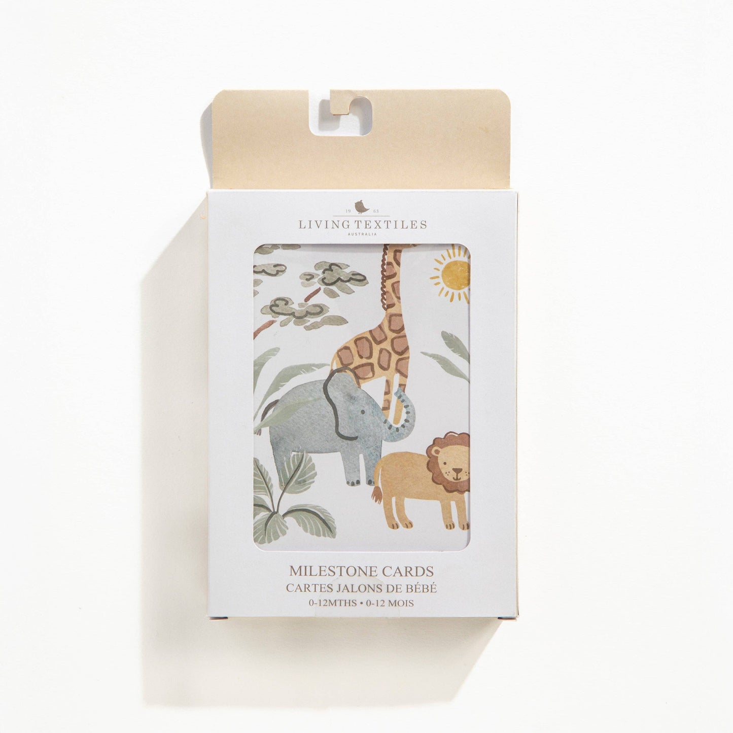 Packaging of milestone cards with animal illustrations on a white background