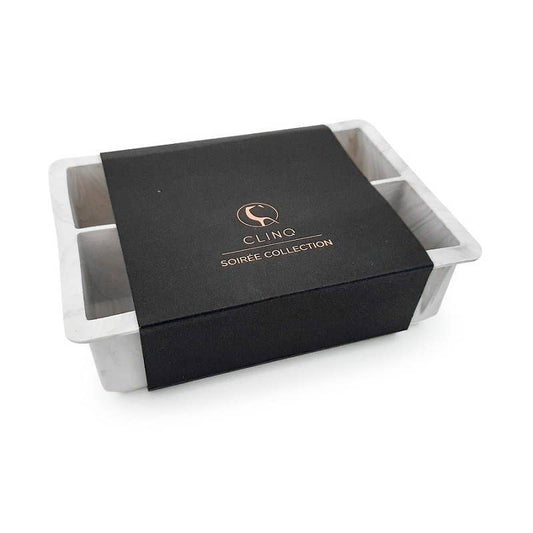 Black box with silver accents and 'CLINQ' branding on a white background