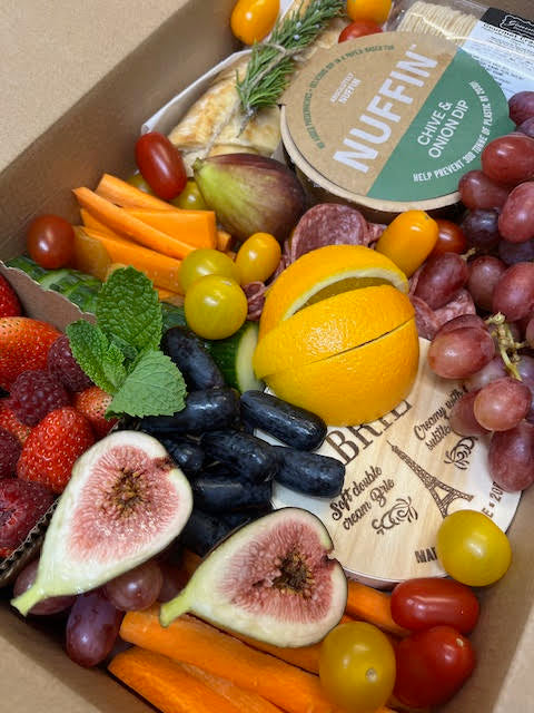picnic box with fruits vegetable and meats