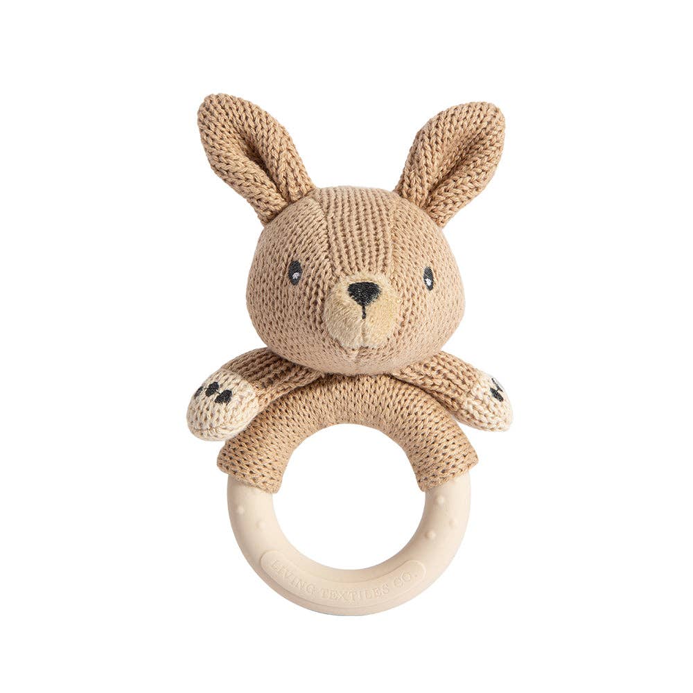 Knitted Kangaroo rattle with wooden ring on a white background