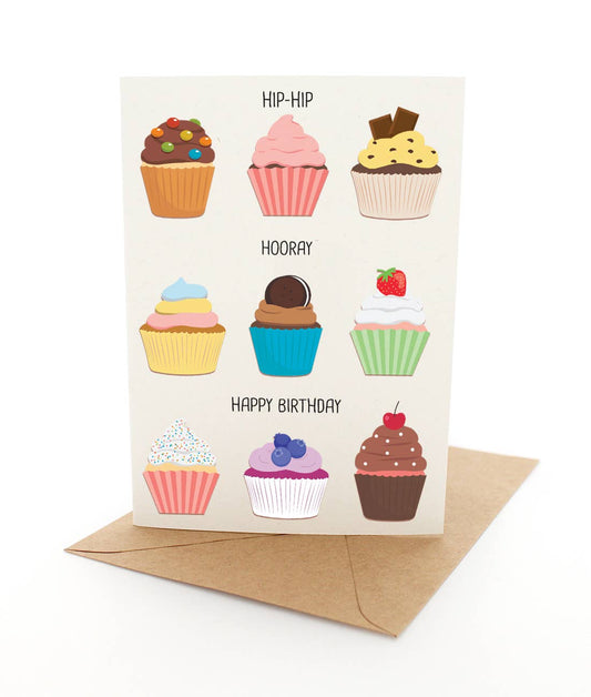 Greeting card with illustrations of colorful cupcakes and a brown envelope on a white background