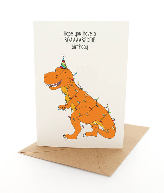 Greeting card with a dinosaur illustration and birthday message on a white background