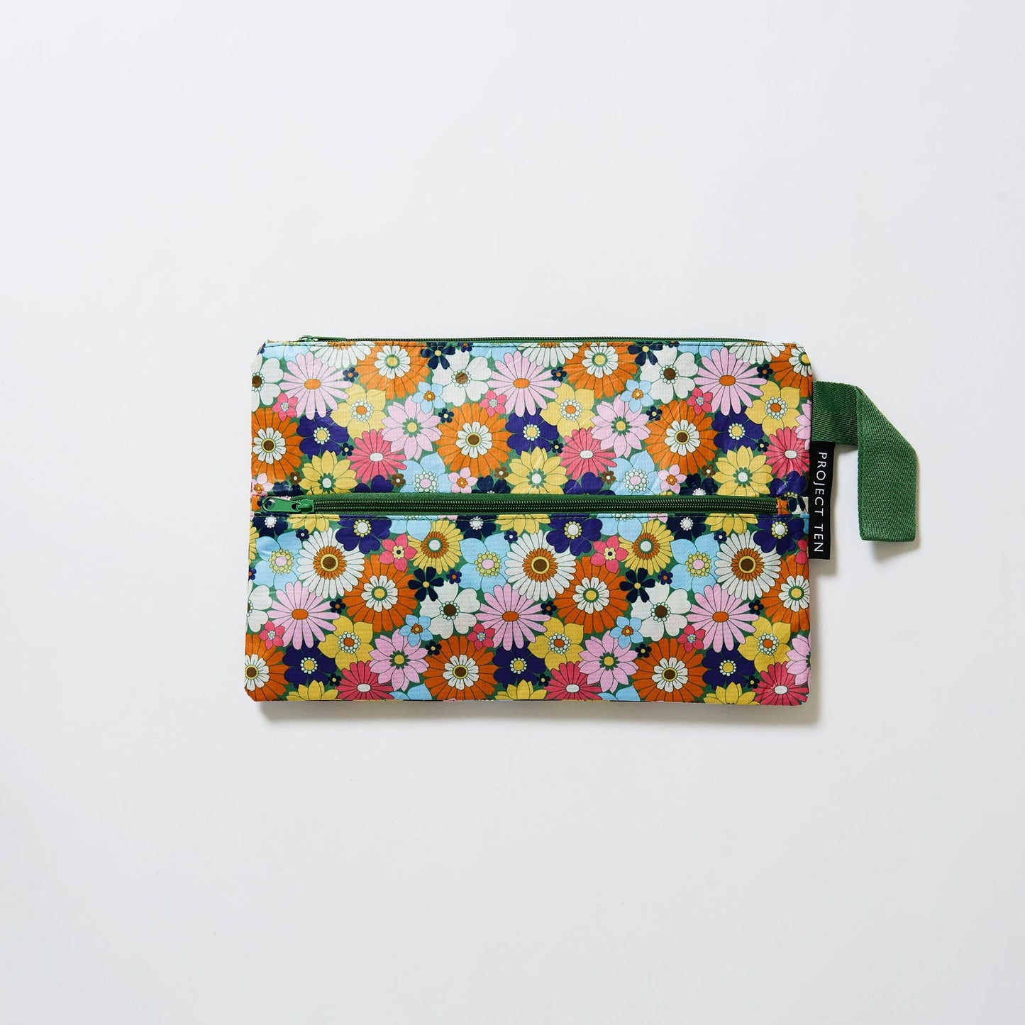 Floral-patterned pouch with a green zipper on a white background
