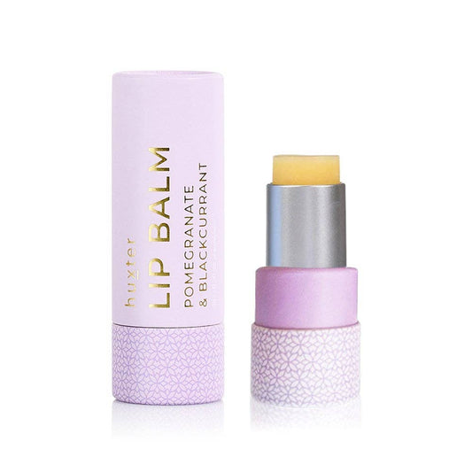 Lip balm with purple packaging on a white background