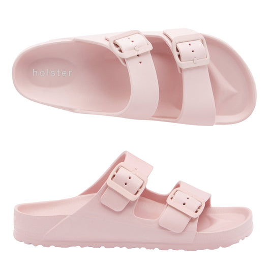 Pair of pink sandals with 'holster' branding on a white background