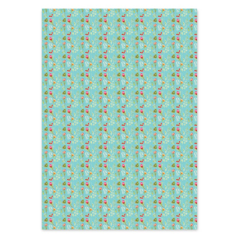 Patterned paper with small colorful designs on a blue background