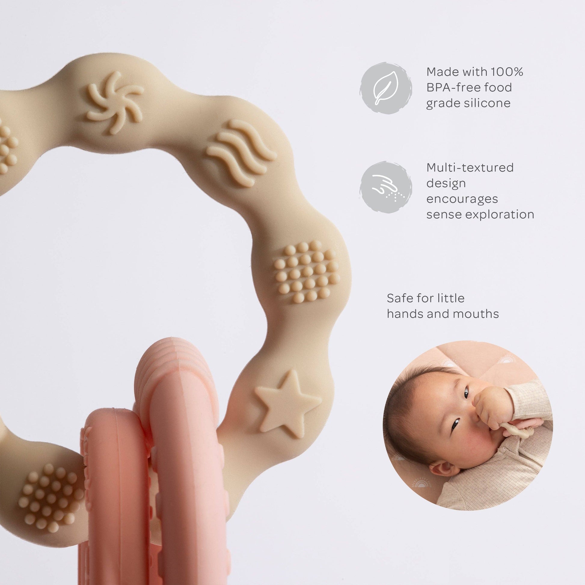 Silicone teething ring with text highlighting safety and features on a light gray background