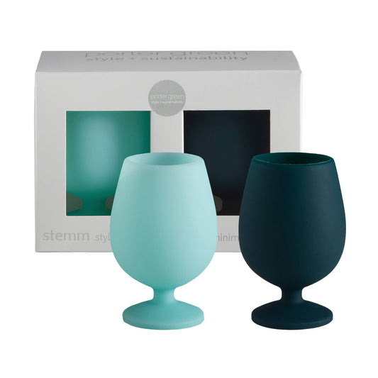 Two teal-colored goblets in front of a white box with 'stumm' branding.