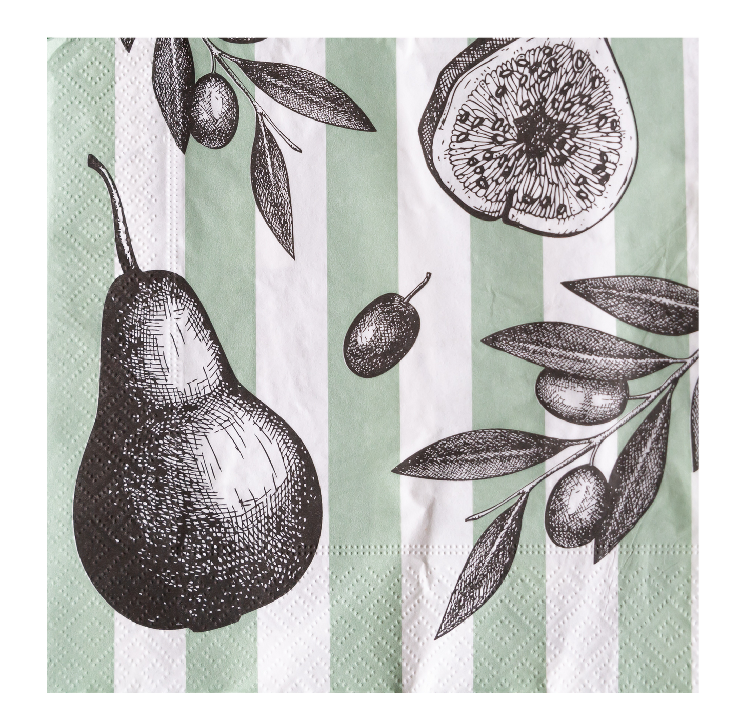 Napkin with black pear, fig, and olive illustrations on a green and white striped background