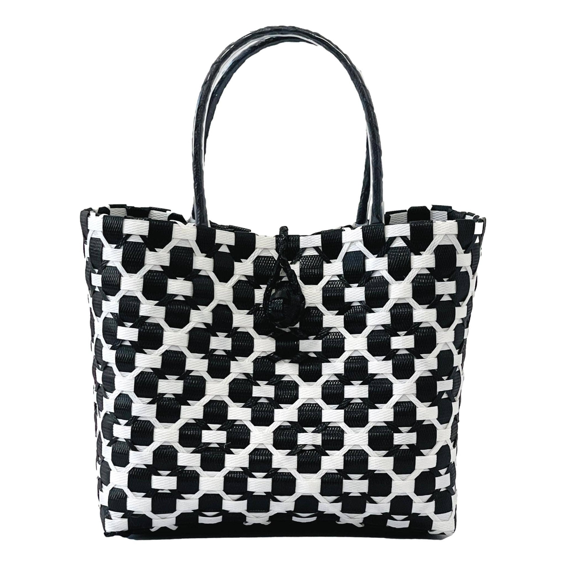 Black and white patterned tote bag on a white background
