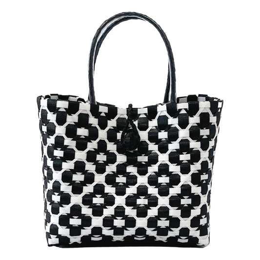 Black and white patterned tote bag on a white background