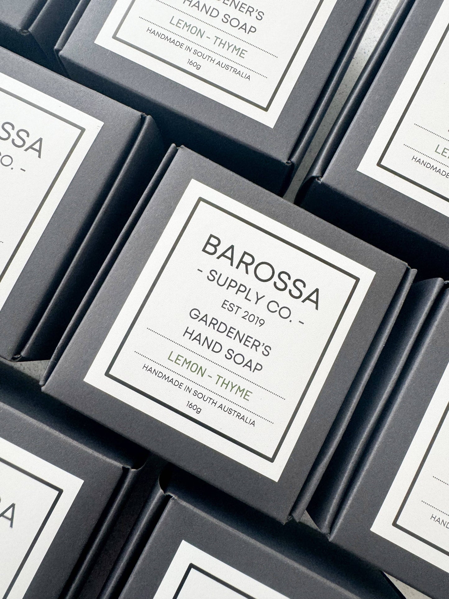 Barossa Supply Co. hand soap packaging with labels on a gray background