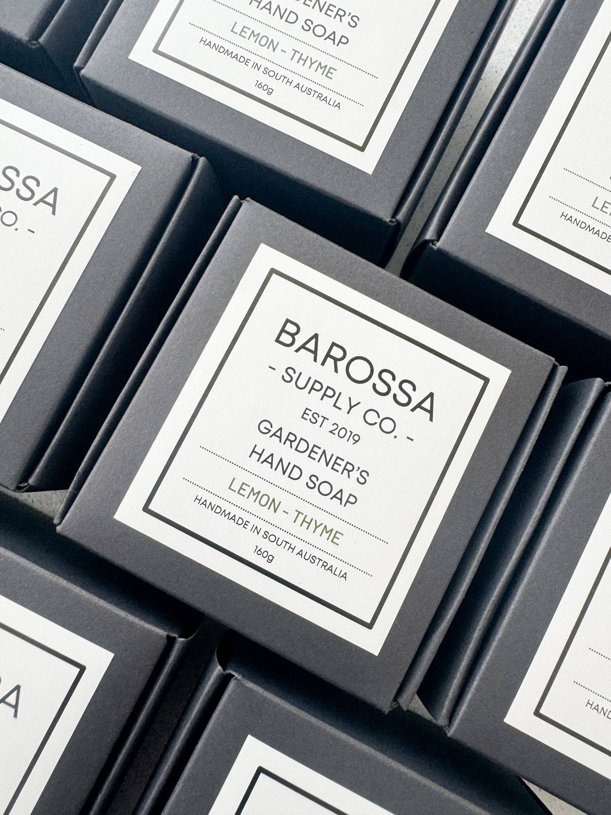 Barossa Supply Co. hand soap packaging with labels on a gray background