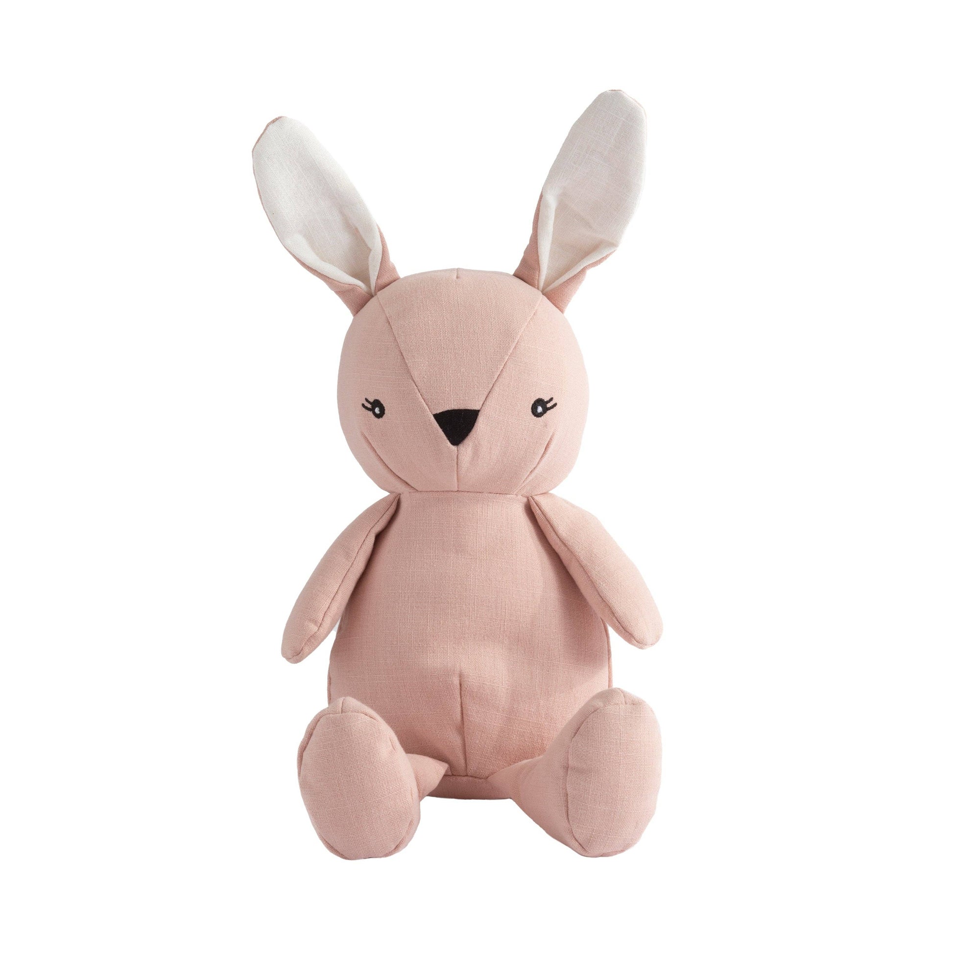 Pink plush rabbit toy on a white background