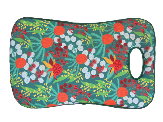 Colorful floral-patterned cushion on a white background