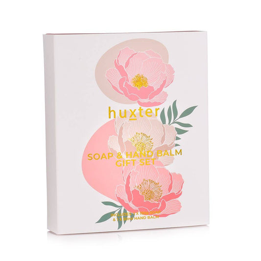 Gift set packaging with floral design and 'huxter' branding on a white background