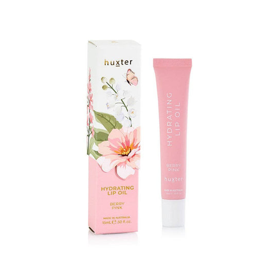 Huxter hydrating lip oil with packaging on a white background