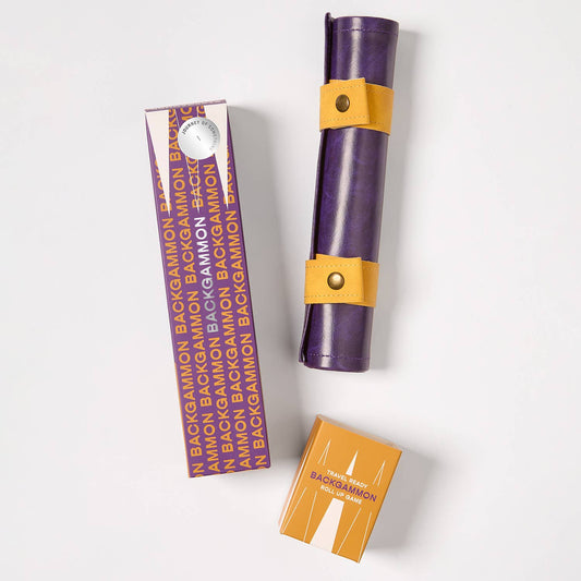 Purple backgammon set with yellow accents on a white background