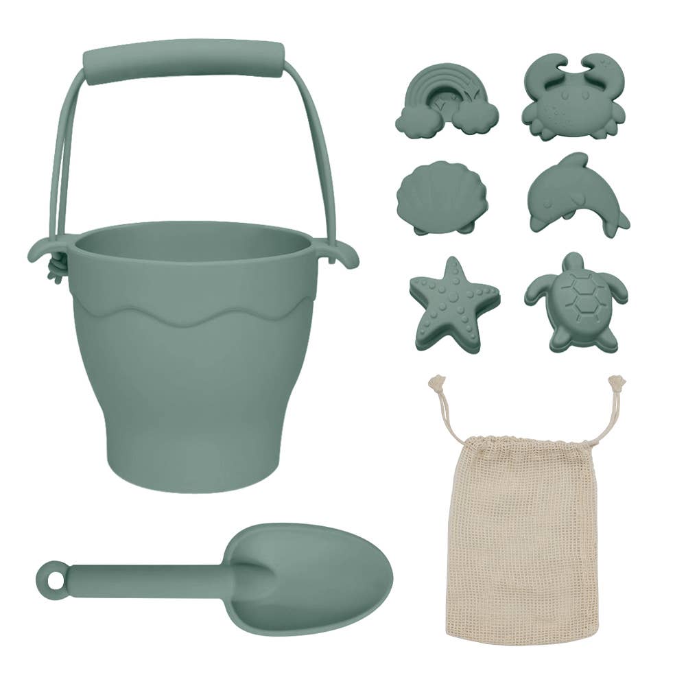 An 8-piece silicone bucket and spade set in sage green, including a bucket with a handle, a spade, and six silicone molds with a cotton storage bag.