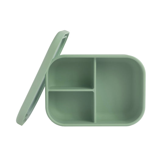 Green divided lunch box with a lid on a white background