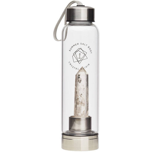 A clear glass water bottle with a silver metal cap and base, featuring a white crystal point insert and a white loop strap. The bottle has black printed text reading 'SUMMER SALT BODY CRYSTAL AIR'.