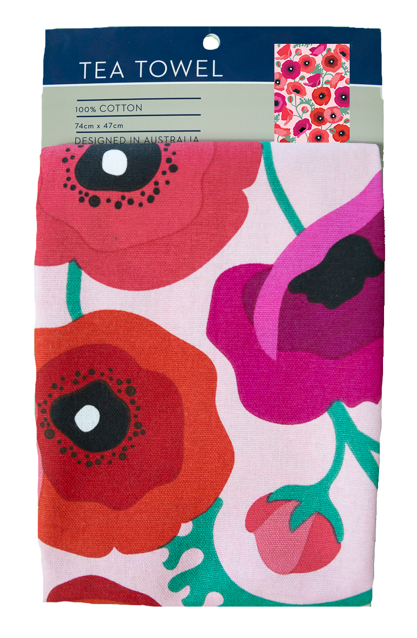 Tea towel with floral design in packaging