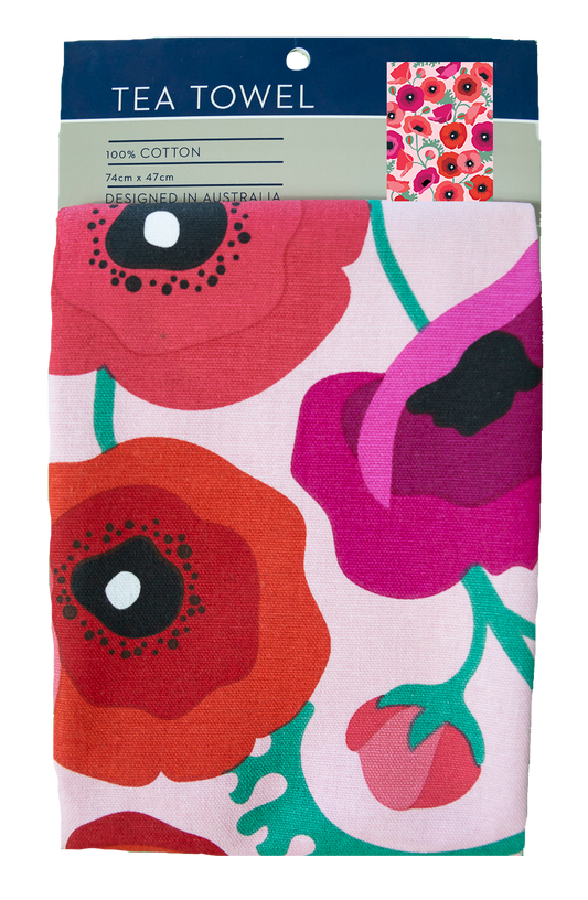 Tea towel with floral design in packaging
