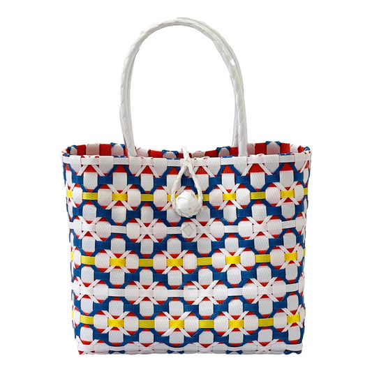 Woven handbag with geometric pattern on a white background
